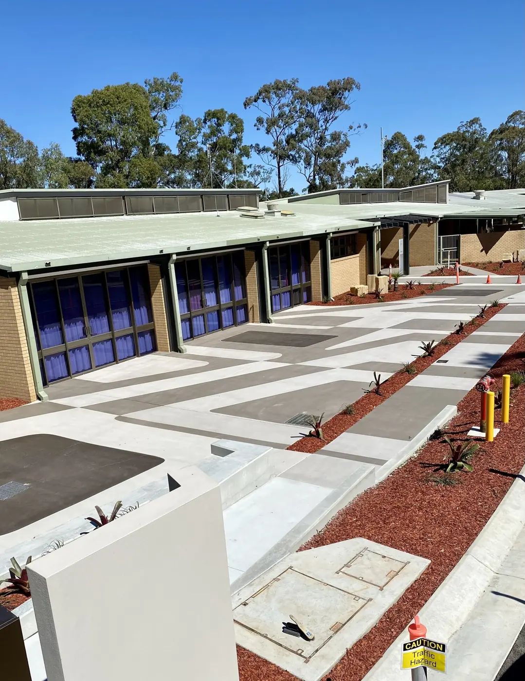 New concrete driveway and paths at a townhouse complex